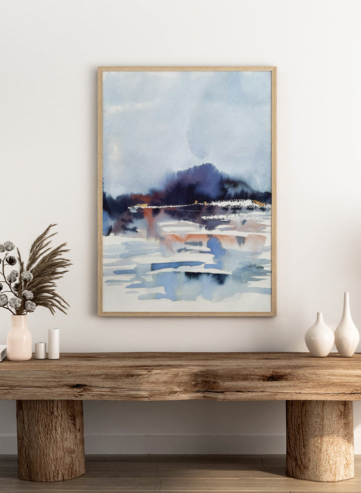 Shop Misty Mountain Lake by Helena Ryhle, a watercolor landscape wall art print poster featuring a misty lake, distant mountains, and atmospheric blue scenery.