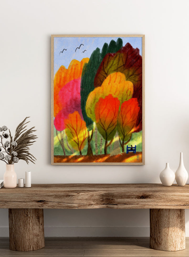 A colorful abstract landscape painting featuring stylized trees in shades of orange, yellow, red, green, and pink under a light blue sky with birds. Shop Cat On a Park Bench and Autumn Trees by Dirkie Nell, a colorful autumn landscape and animal art print featuring a black cat, park bench, and vivid fall trees.