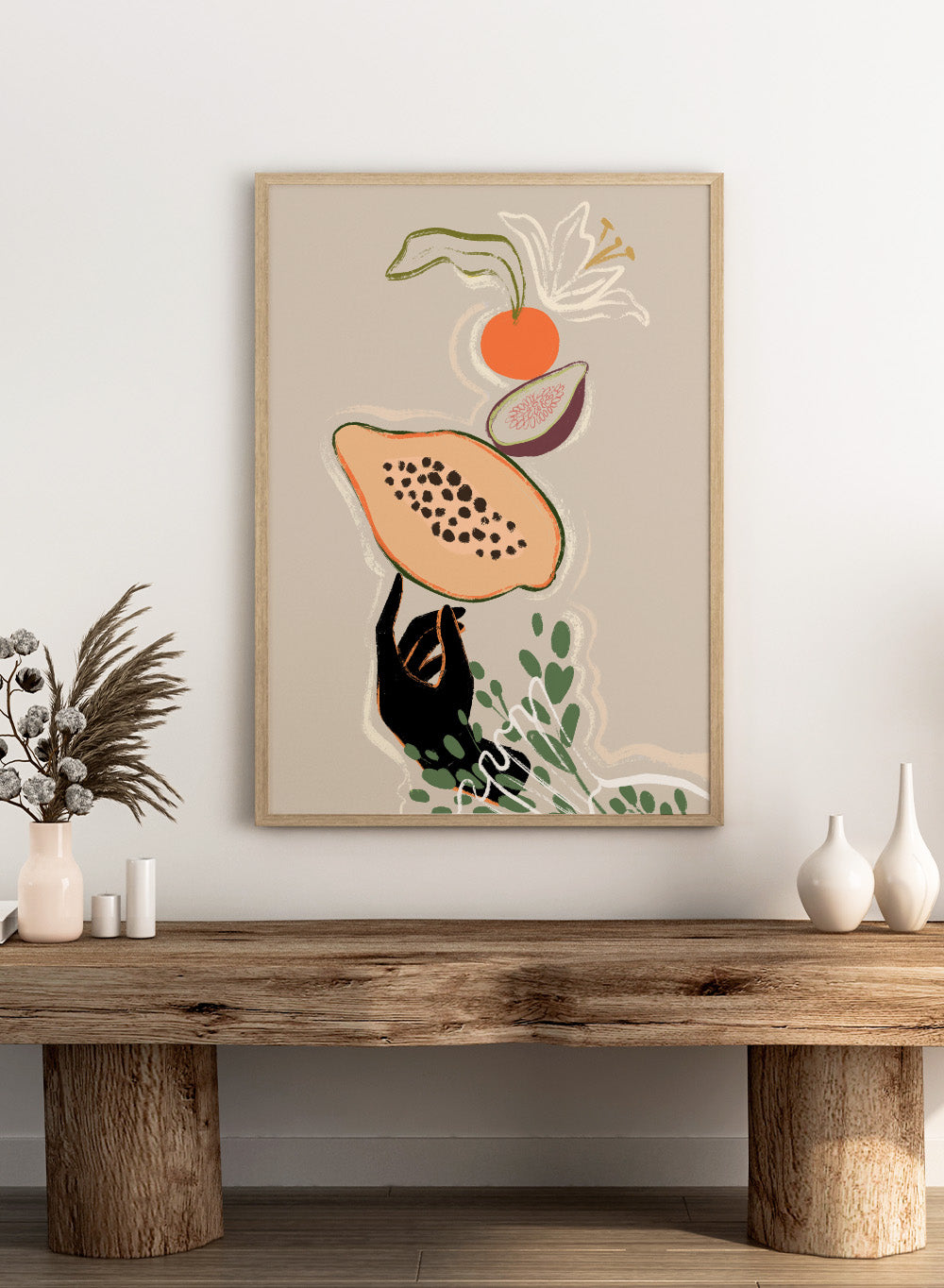 Illustration of a sloth holding a papaya with a beige background. Balancing Fruits by Arty Guava is a modern fruit still life art print with papaya and fig. Officially licensed wall poster for kitchen decor.