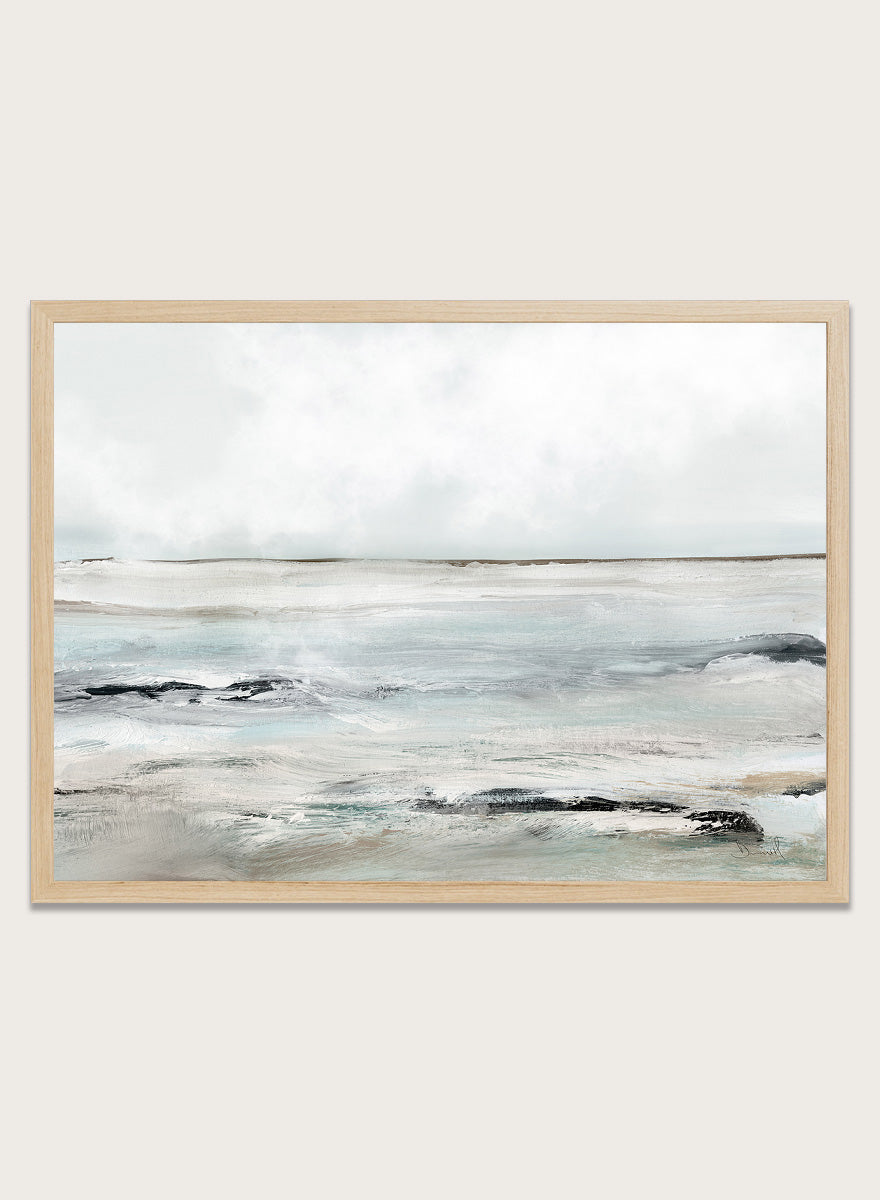 Shop Sandy Bay by Dan Hobday, a coastal landscape art print featuring soft blue-gray water, pale sky, textured shoreline, and layered neutral brushwork.