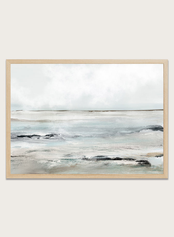 Shop Sandy Bay by Dan Hobday, a coastal landscape art print featuring soft blue-gray water, pale sky, textured shoreline, and layered neutral brushwork.