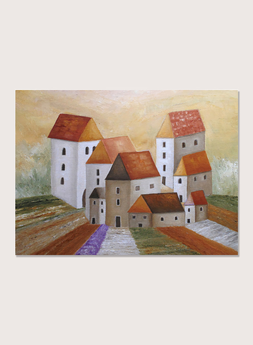 A framed landscape painting depicting stylized white buildings with orange-brown roofs, set in a field with a purple path under a warm yellow sky. Shop Peaceful Lavender Village by Angeles M. Pomata, an autumn village landscape art print featuring white houses, terracotta roofs, lavender fields, and warm earthy tones.
