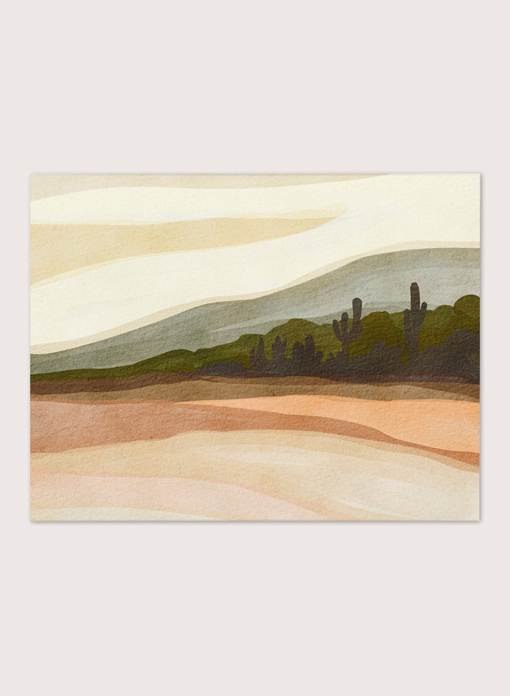 Shop Saguaro Desert Hills by Nikita Jariwala, a desert wall art print poster with saguaro cacti, layered hills, and warm sand, peach, olive, and cream tones.