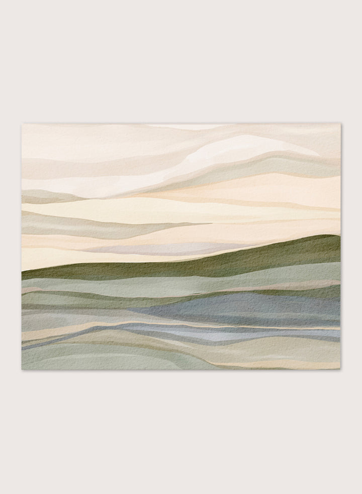 Framed abstract landscape wall art featuring layered hills and mountains in soft beige, cream, sage green, and muted blue tones. Shop Serene Rolling Hills by Nikita Jariwala, an abstract landscape wall art print poster featuring layered hills, distant mountains, and soft green tones.