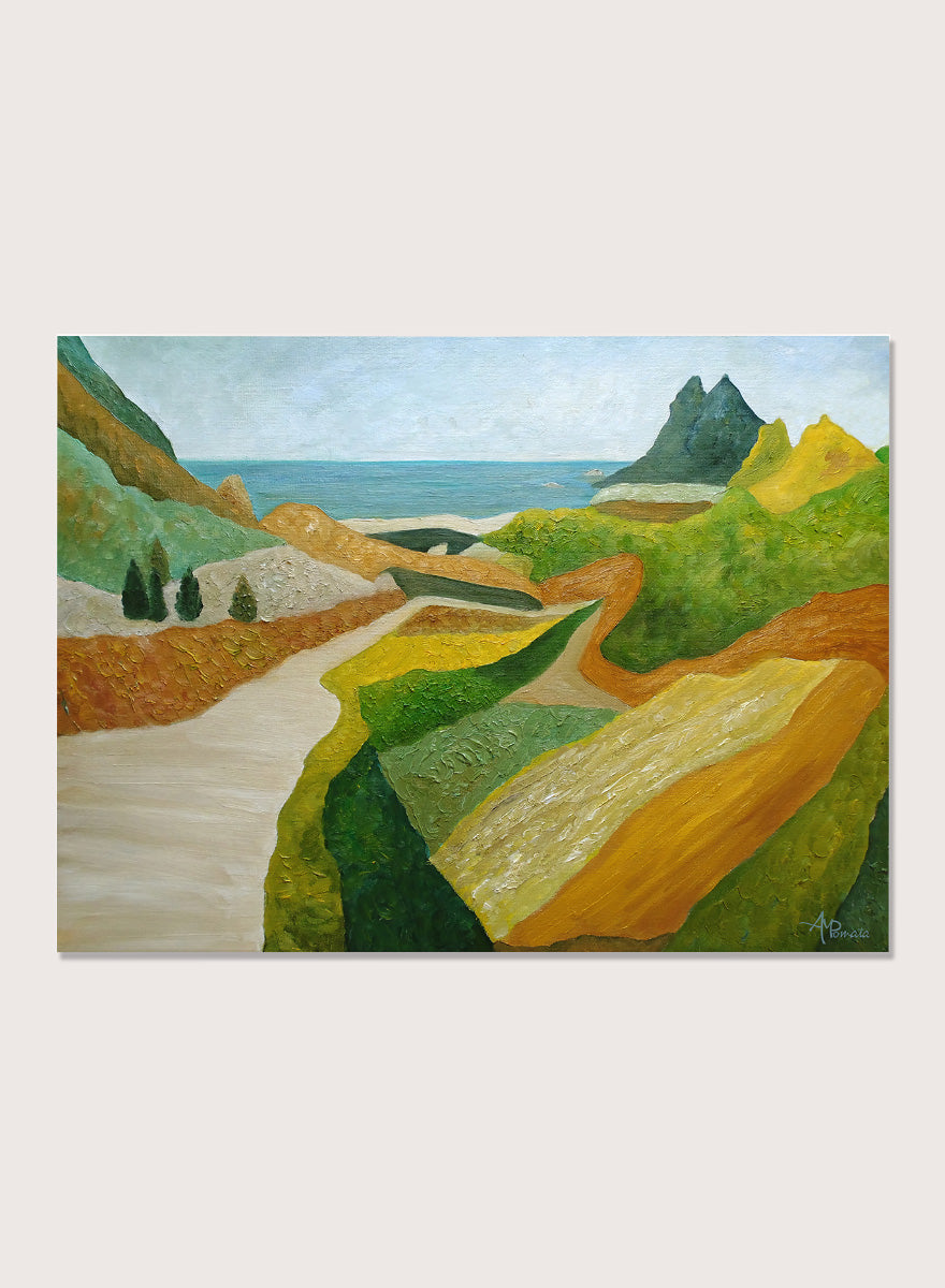 A framed landscape painting featuring a winding cream-colored path through green and ochre hills, leading to a blue sea and distant mountain under a pale sky. Shop Vibrant Coastal Vista by Angeles M. Pomata, a colorful coastal landscape art print featuring winding roads, rolling fields, rugged hills, and blue sea views.