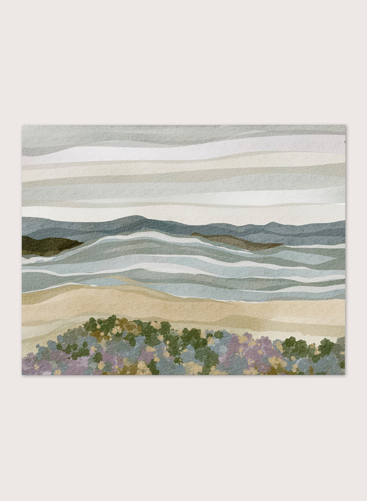 Shop Abstract Coastal Serenity by Nikita Jariwala, a modern coastal wall art print poster with layered waves, sandy shore, and soft blue, beige, green, and lavender tones.