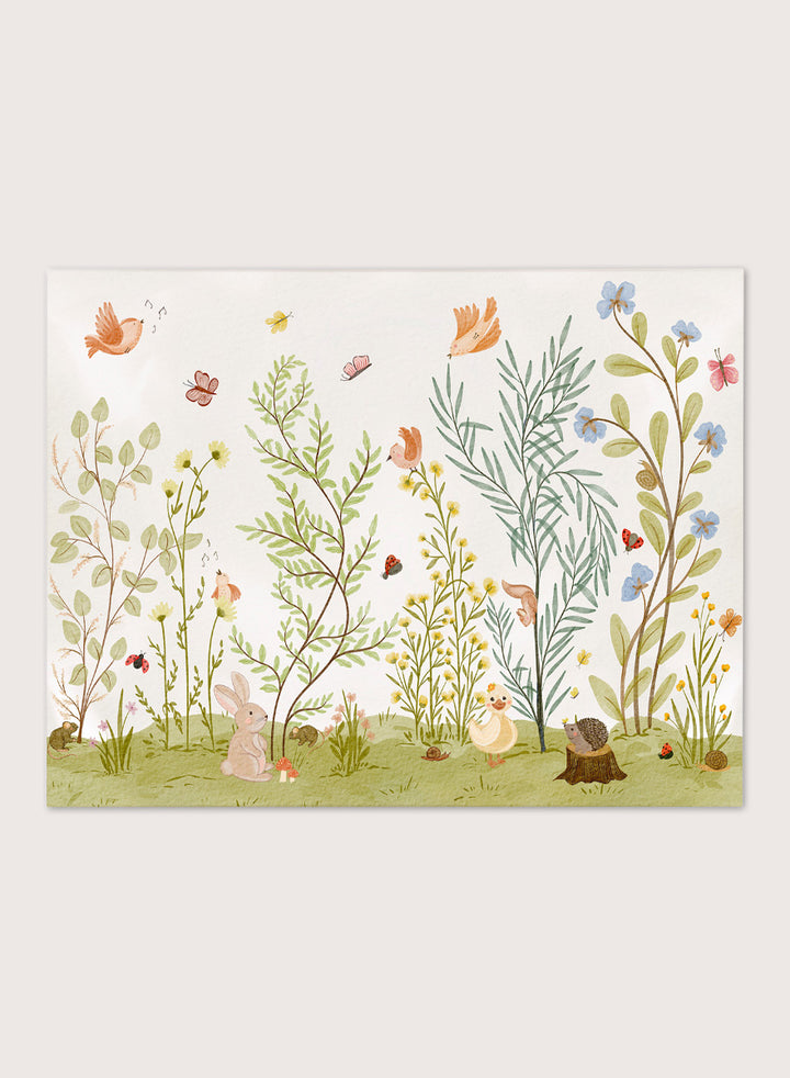 A framed art print featuring a whimsical, watercolor-style illustration of a garden with birds, butterflies, flowers, rabbits, and small animals on a light cream background. Shop Woodland Animal Friends by Nikita Jariwala, a woodland animal wall art print poster with rabbit, duck, hedgehog, butterflies, flowers, and green tones.