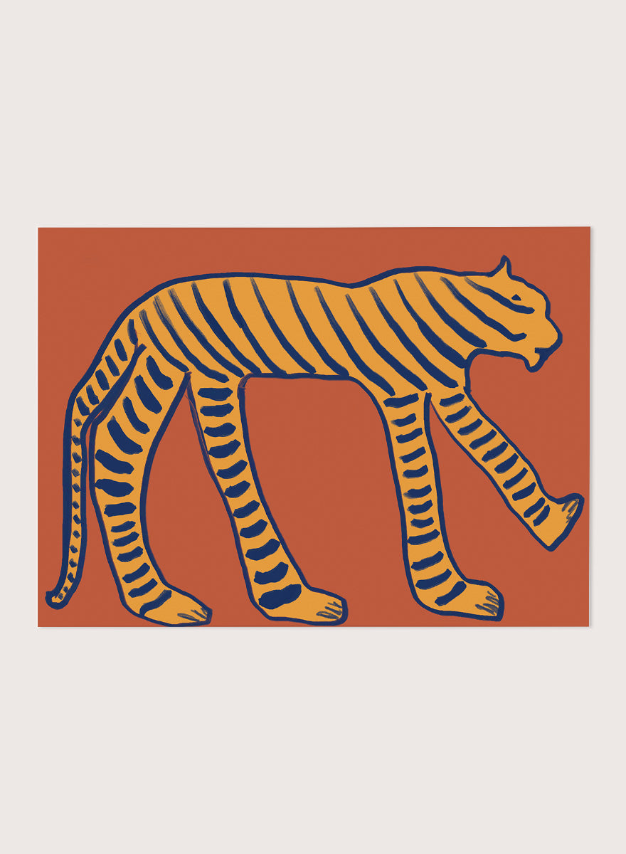 Bold Tiger Stride by The Art Concept animal art print featuring an ochre tiger with deep blue stripes on a warm rust background.