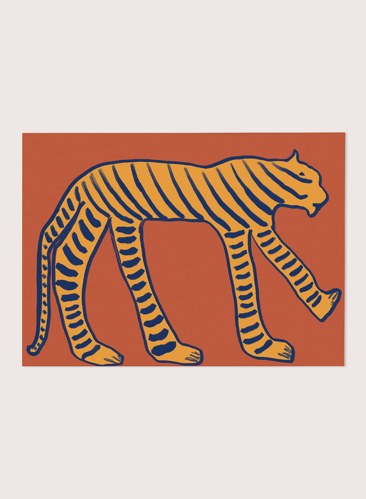 Bold Tiger Stride by The Art Concept animal art print featuring an ochre tiger with deep blue stripes on a warm rust background.