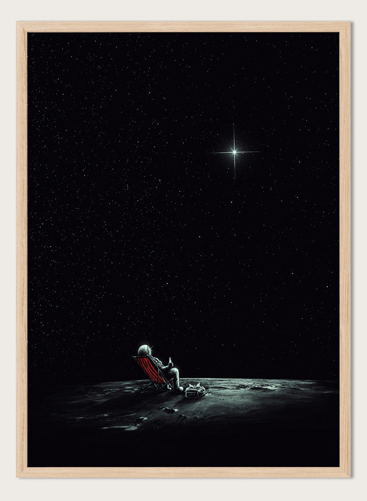 Person sitting on a chair under a starry sky. Astronaut Star Gazer by Nicebleed is a surreal space art print featuring a lone astronaut under a star-filled sky, modern aesthetic wall poster.