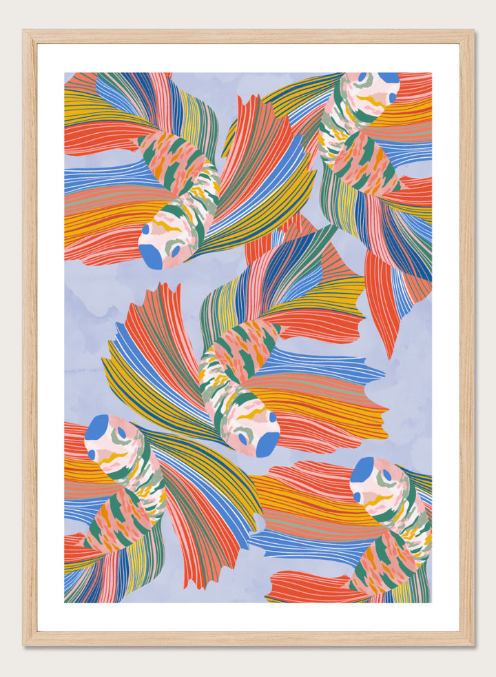 A framed art print featuring a colorful pattern of stylized fish with flowing striped fins in orange, yellow, green, blue, and red on a light blue background. Vibrant Swirling Fish Pattern by Ceyda Alasar art print featuring colorful flowing fish, striped fins, and playful aquatic movement on a soft blue background.