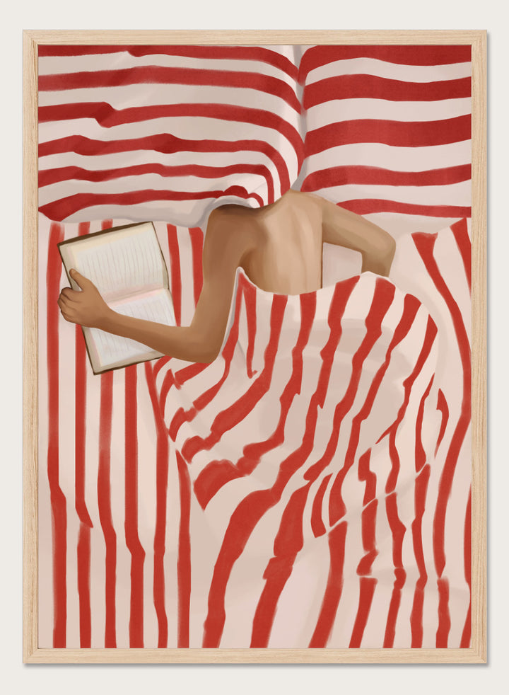 Between the Lines by Flow Line art print shows a woman reading in bed wrapped in red striped bedding. A modern lifestyle wall poster inspired by slow evenings.