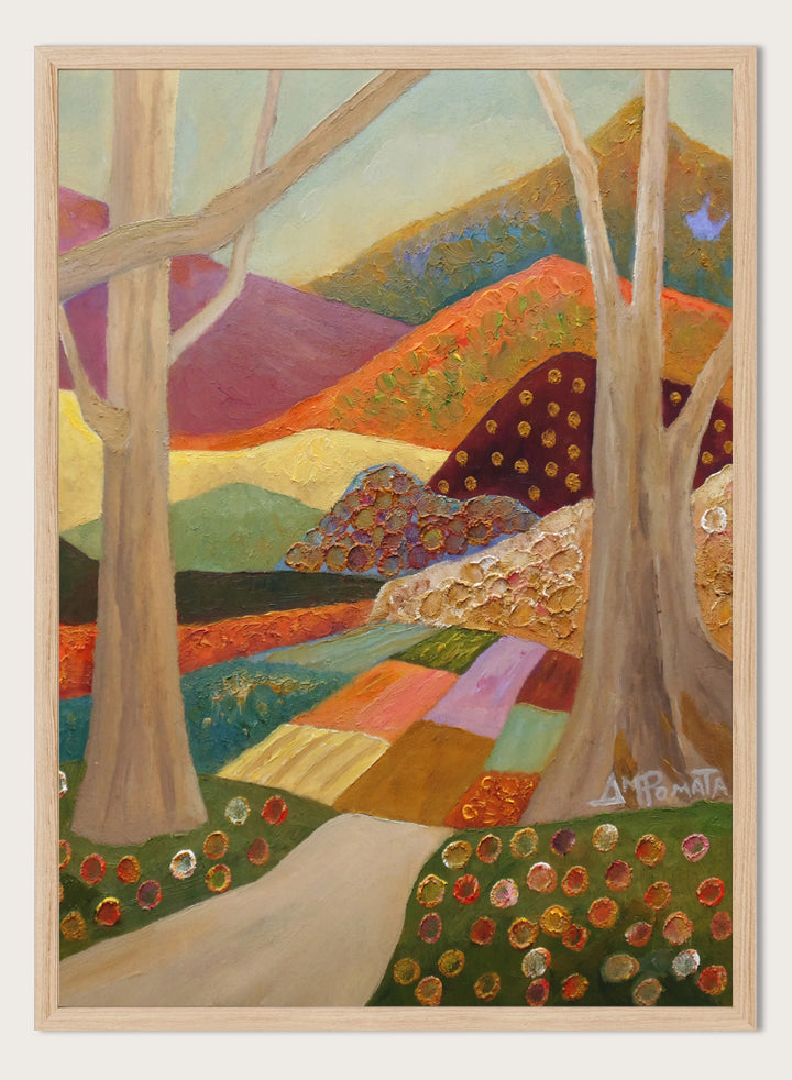 A colorful landscape painting featuring stylized trees, a winding path, patchwork fields, and rolling hills in warm and cool tones, with a visible artist signature in the lower right. Shop Colorful Field Path by Angeles M. Pomata, an autumn landscape art print featuring a winding path, textured fields, flowers, and rolling countryside.