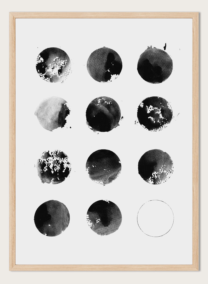 Black and white pattern of circular shapes on a textured background. Fluid Black Circles by Florent Bodart is a minimalist abstract art print with black ink circles, a modern black and white wall poster with graphic grid design.