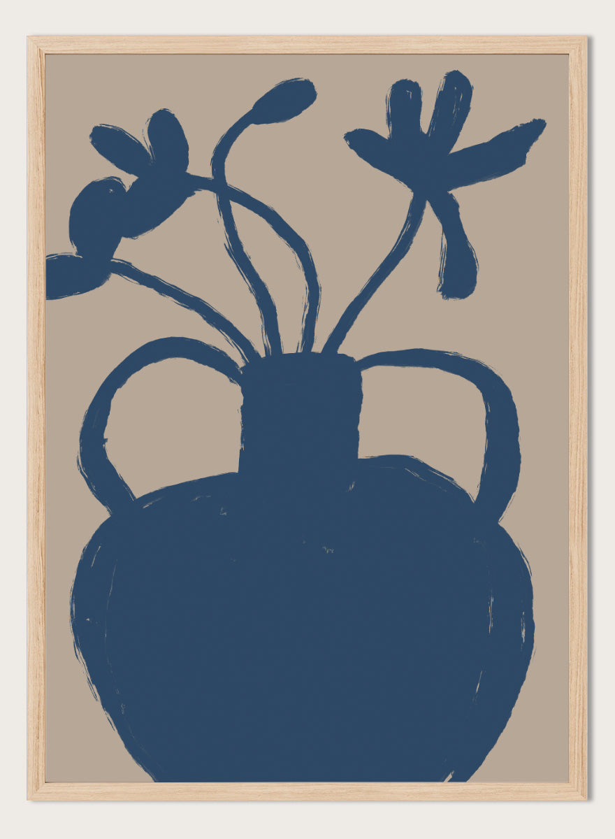A minimalist art print featuring a dark blue silhouette of a vase with two handles and abstract flower stems, set against a warm beige background. Minimalist Blue Blooms by The Art Concept is a modern floral art print featuring a deep blue vase, loose flowers, and a warm beige background.