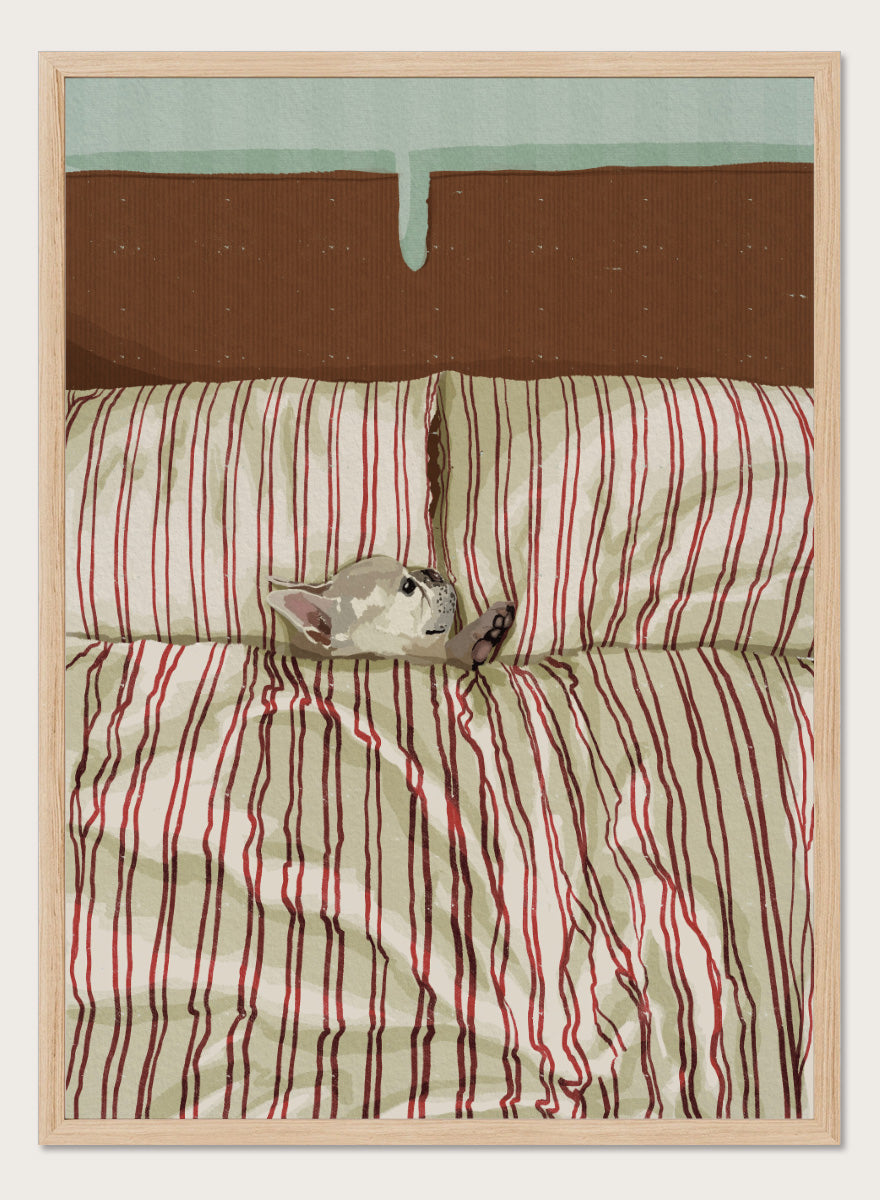 A cozy bed setup with beige and red striped bedding, two matching pillows, and a small gray cat curled up on the duvet. The background features a brown textured headboard and a mint green wall at the top. Shop Cozy Dog in Bed by Lisa Solomoniuk, a playful dog animal art print featuring a pup tucked into striped bedding with a warm, cozy bedroom feel.