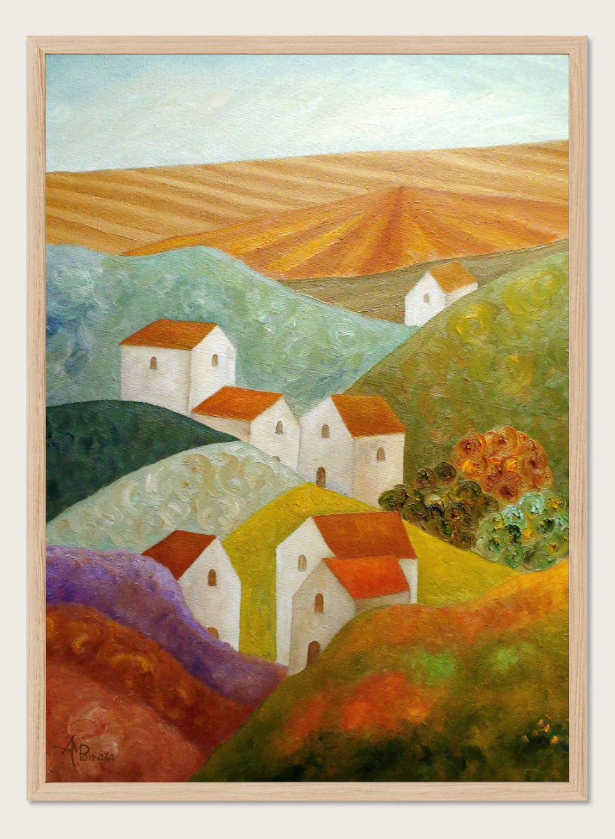 A colorful landscape painting featuring white houses with orange-red roofs nestled among rolling hills in shades of green, purple, yellow, and orange, with a plowed field under a pale sky in the background. Shop Colorful Hillside Village by Angeles M. Pomata, an autumn countryside art print featuring white houses, rolling hills, warm fields, and earthy color.