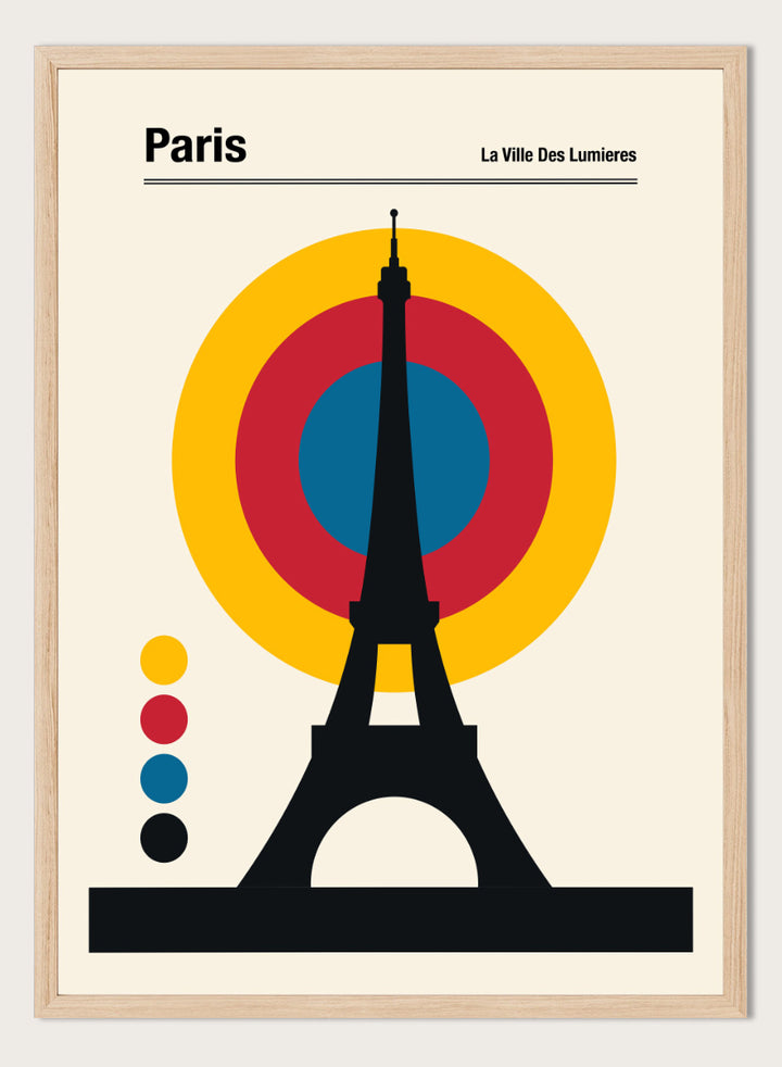 A minimalist Paris poster featuring a black Eiffel Tower silhouette in front of concentric yellow, red, and blue circles on a cream background, with the text &