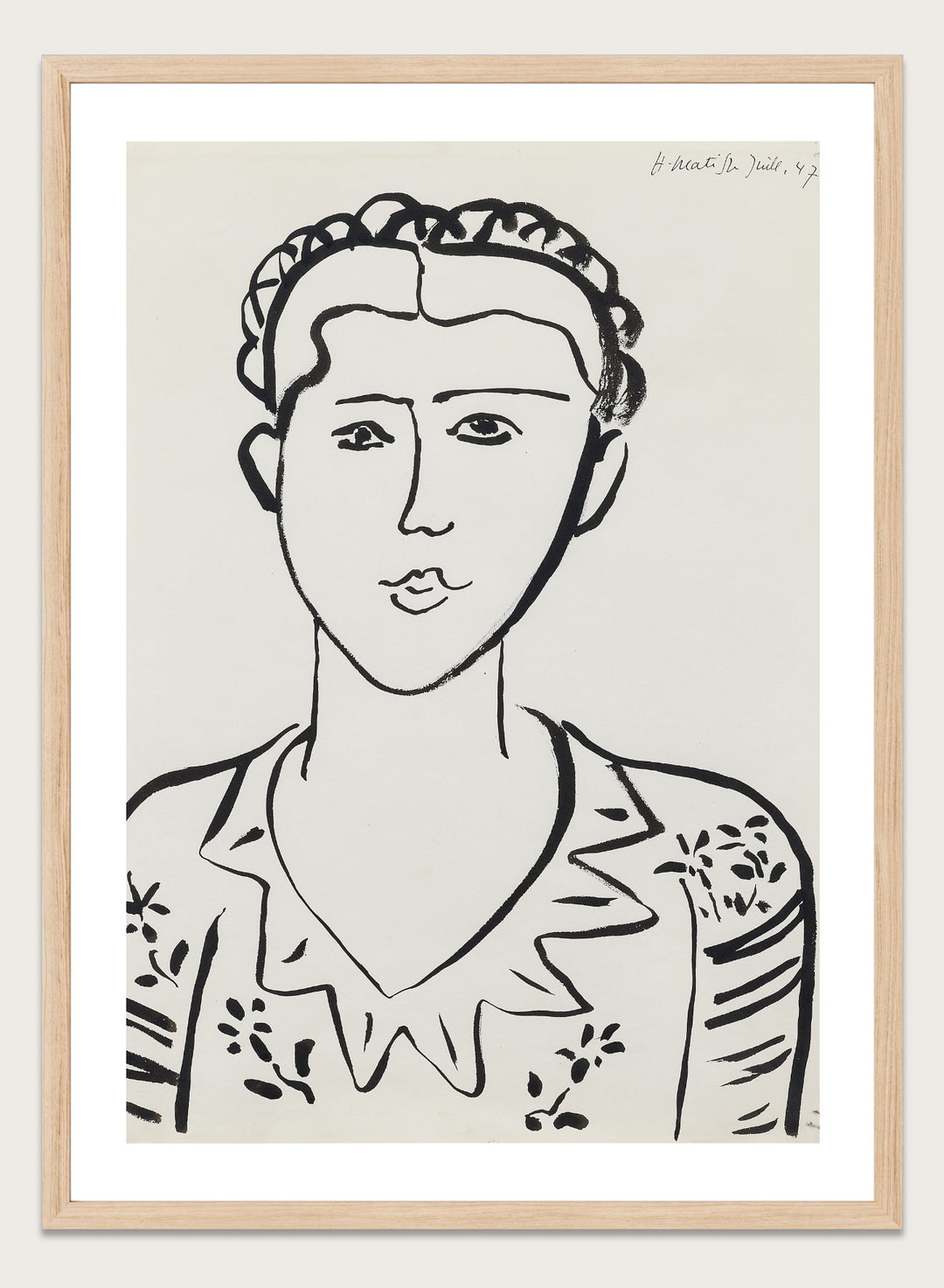 Black line drawing of a woman's portrait on a white background. Portrait de femme by Henri Matisse is a minimalist portrait art print featuring expressive black linework, modern French design, and iconic mid century style.