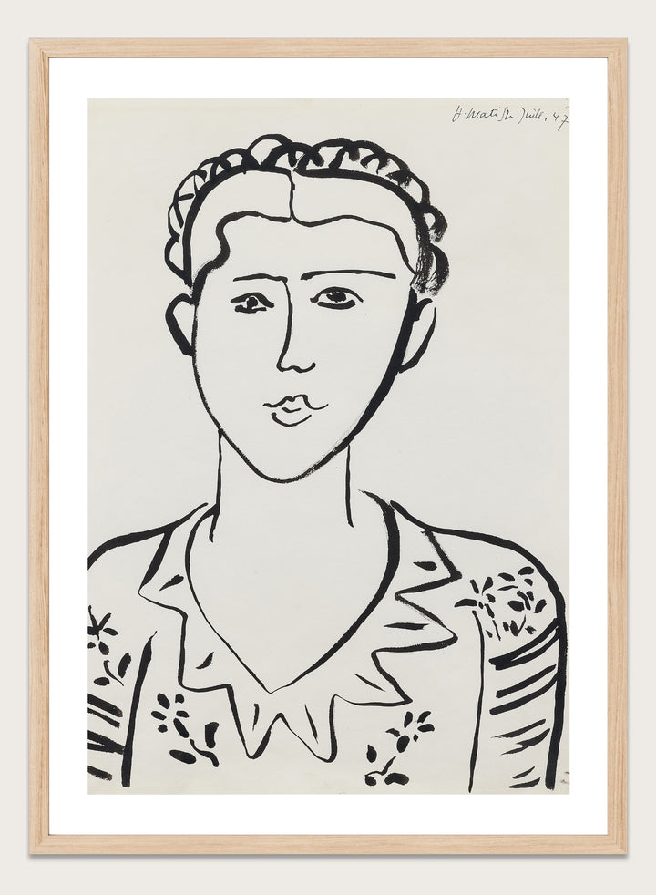Black line drawing of a woman's portrait on a white background. Portrait de femme by Henri Matisse is a minimalist portrait art print featuring expressive black linework, modern French design, and iconic mid century style.