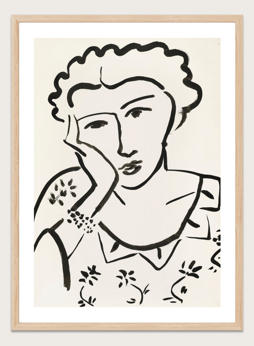 Black line art of a woman with floral patterns on a white background. Jeune Fille Accoudée by Henri Matisse is a minimalist portrait art print featuring expressive black linework, floral detailing, and refined French modernist design.