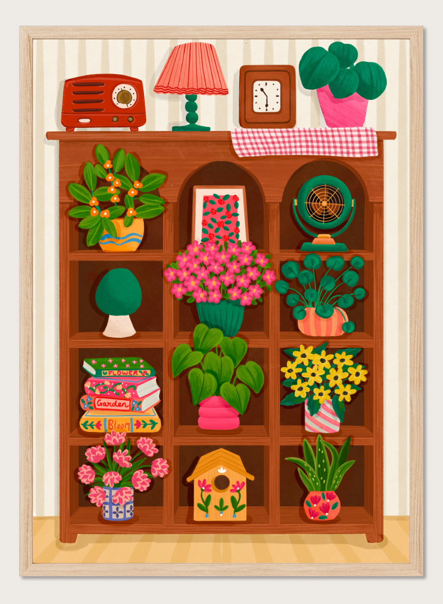 A colorful cartoon-style illustration of a wooden bookshelf filled with potted plants, flowers, books, a lamp, a clock, a radio, and other home decor items, set against a striped wall. Shop Cozy Botanical Shelf by Nidhi Kachhadiya, a colorful botanical wall art print featuring houseplants, flowers, vintage decor, and warm green and pink tones.