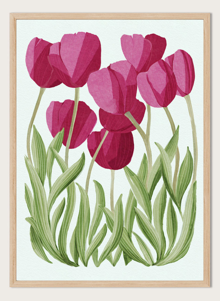 A stylized floral illustration of pink tulips with green leaves on a white background. Shop Tulips Floral Art Print by Katie O&