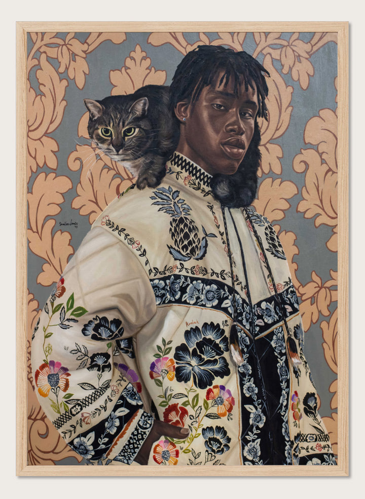 A stylized portrait painting of a Black man wearing an ornate cream jacket with colorful floral embroidery, seated against a patterned wallpaper background with a gray tabby cat on his shoulder. Shop Man and Cat Portrait by Damilare Jamiu, a contemporary figurative wall art print featuring a man with a cat, embroidered clothing, and rich floral detail.