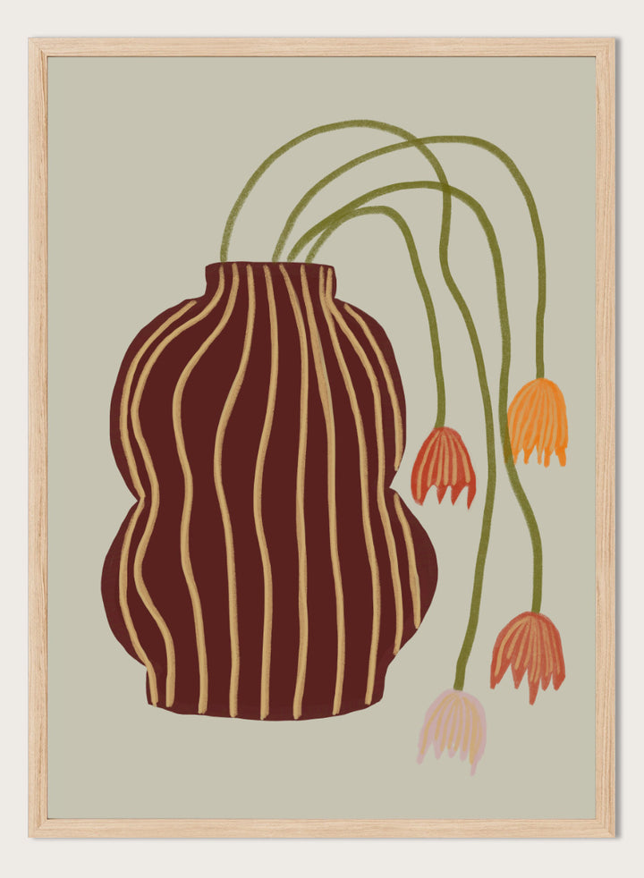 A stylized botanical art print featuring a dark brown vase with vertical gold stripes and several trailing flowers in orange, pink, and olive green on a warm beige background. Striped Vase Drooping Flowers by The Art Concept art print featuring a burgundy striped vase and soft drooping blooms in warm earthy tones.