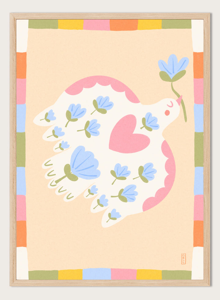 A framed art print featuring a whimsical illustration of a white dove with blue flowers and a pink heart, framed by a pastel multicolor border on a light peach background. Shop Flowering Peace Dove by Dirkie Nell, a colorful bird and floral art print featuring a white dove, blue flowers, pink wings, and a playful peace motif.