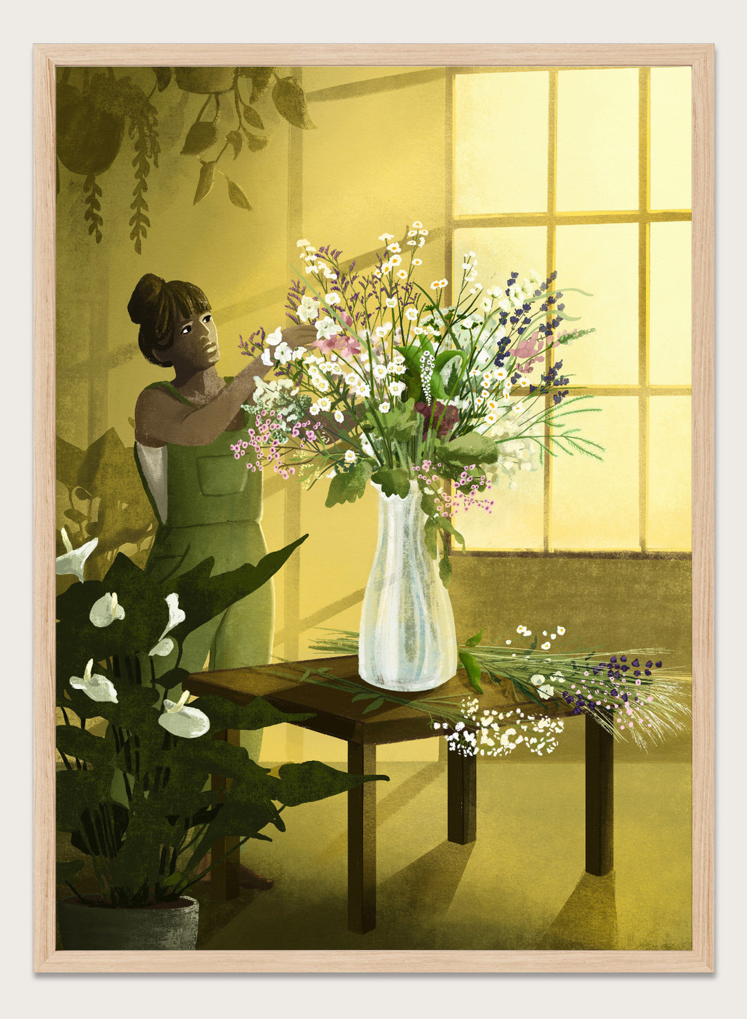 Woman in a green dress holding a bouquet of flowers in a softly lit room. In the Cracks of Light I Dream by Goed Blauw is a floral art print and wall poster featuring a woman arranging flowers in warm window light.