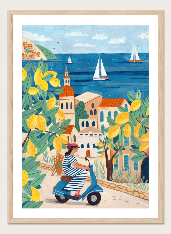 Illustration of a woman on a scooter with lemon trees and a coastal town in the background. Lemon Grove Scooter Ride by Caroline Bonne Müller summer coastal illustration art print with lemons, scooter and seaside town, colorful wall art poster