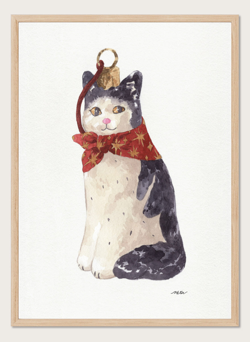 Shop Christmas Cat Ornament by NKTN, a festive cat animal wall art print poster featuring a black-and-white cat in a red star scarf with watercolor detail.