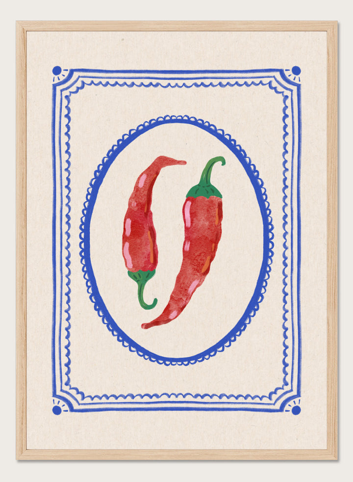 Spicy Chili Peppers by Katarzyna Gąsiorowska kitchen art print featuring red chilies in an ornate cobalt frame with vintage Mediterranean style.