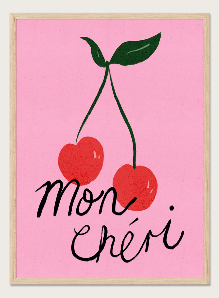 Two red cherries with green stems on a pink background and 'mon chéri' text. Mon Chéri by Dirkie Nell is a cherry typography art print featuring bold red fruit and playful lettering. A colorful love-inspired wall poster.