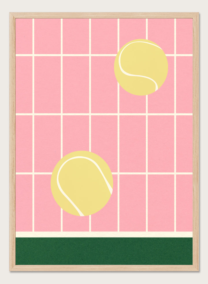 Two yellow tennis balls on a pink grid background with a green stripe at the bottom. Tennis Kitchen by Rosi Feist is a modern minimalist fine art print featuring oversized tennis balls on pink tile. Officially licensed wall poster with optional artisan framing.