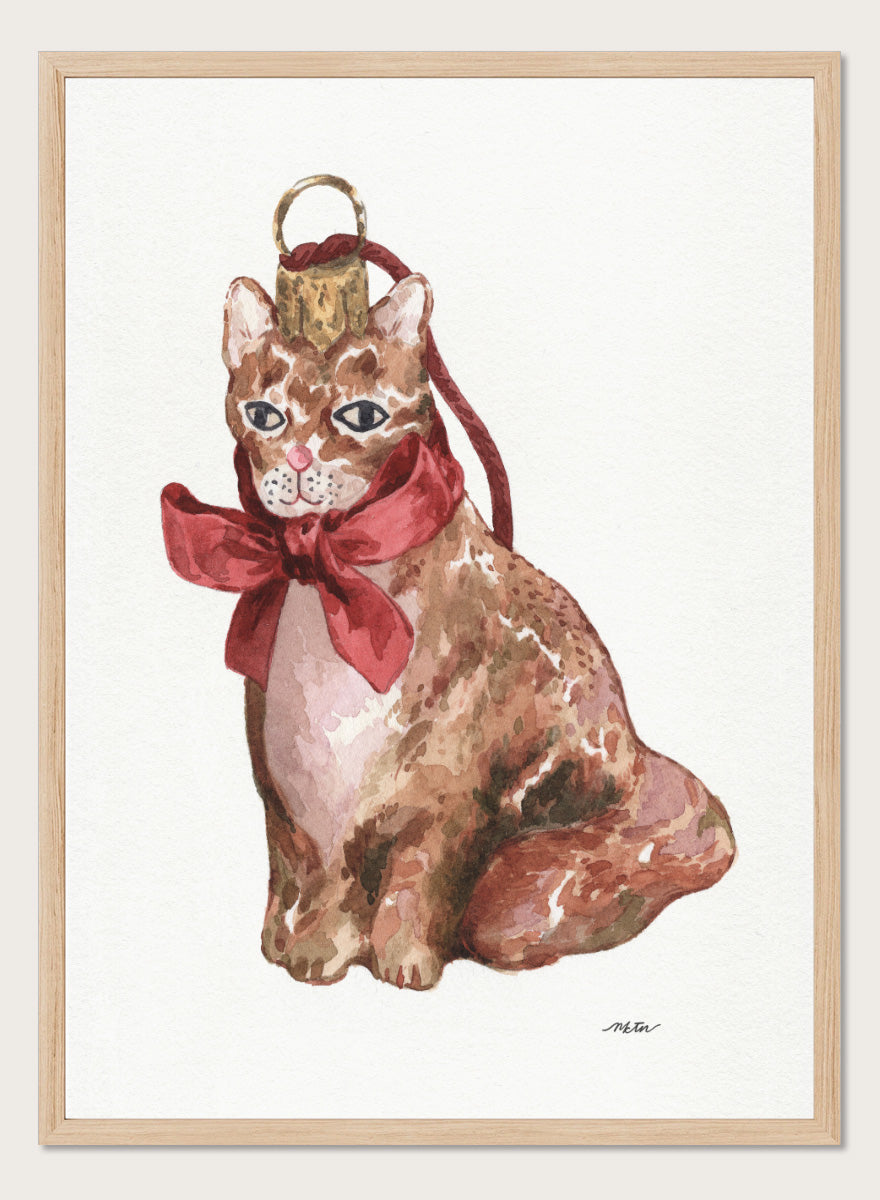 Shop Charming Cat Ornament by NKTN, a festive cat wall art print poster featuring a brown tabby with an oversized red bow and watercolor holiday style.