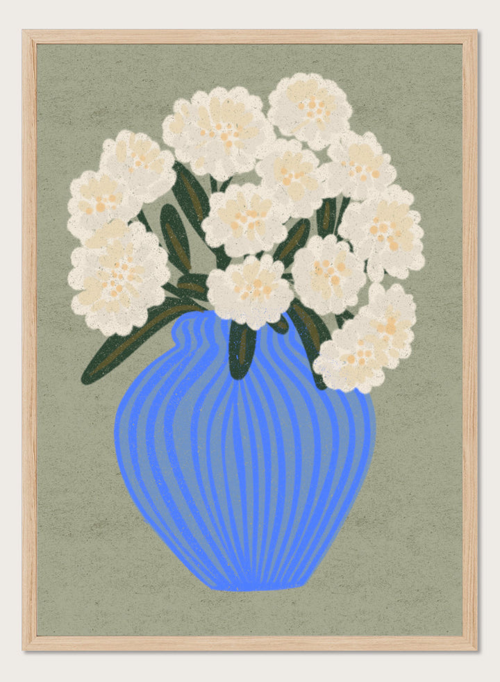 A stylized floral artwork showing a bouquet of off-white flowers with dark green leaves in a blue ribbed vase against a muted sage background. Shop White Blooms Blue Vase by Nikita Jariwala, a floral wall art print poster featuring white flowers in a striped blue vase with modern botanical style.