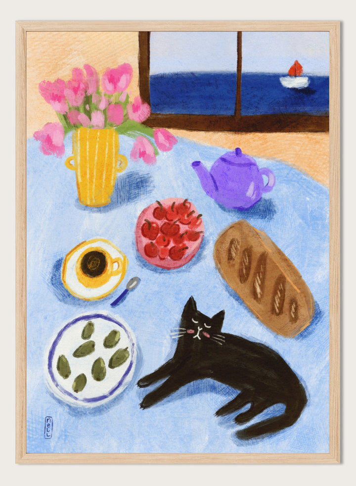 A colorful still life painting of a table scene with pink tulips in a yellow vase, a purple teapot, a bowl of strawberries, a cup of coffee, a loaf of bread, a black cat, and a window view of the sea with a small sailboat. Shop Relaxing Seaside Cat Breakfast by Dirkie Nell, a playful cat and food art print featuring breakfast, flowers, a sailboat, and a seaside view.