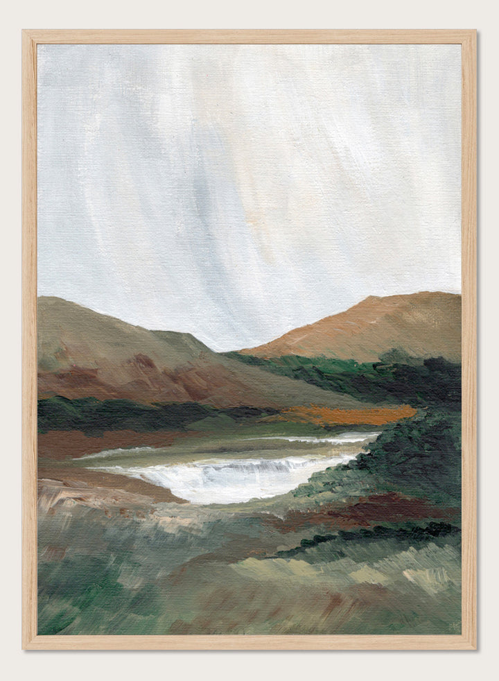 An impressionistic landscape painting of a river or waterfall flowing through a valley, with brown and green hills under a pale sky. Shop Serene Mountain Lake by Nikita Jariwala, a mountain landscape wall art print poster featuring a peaceful lake, wooded hills, and soft green tones.