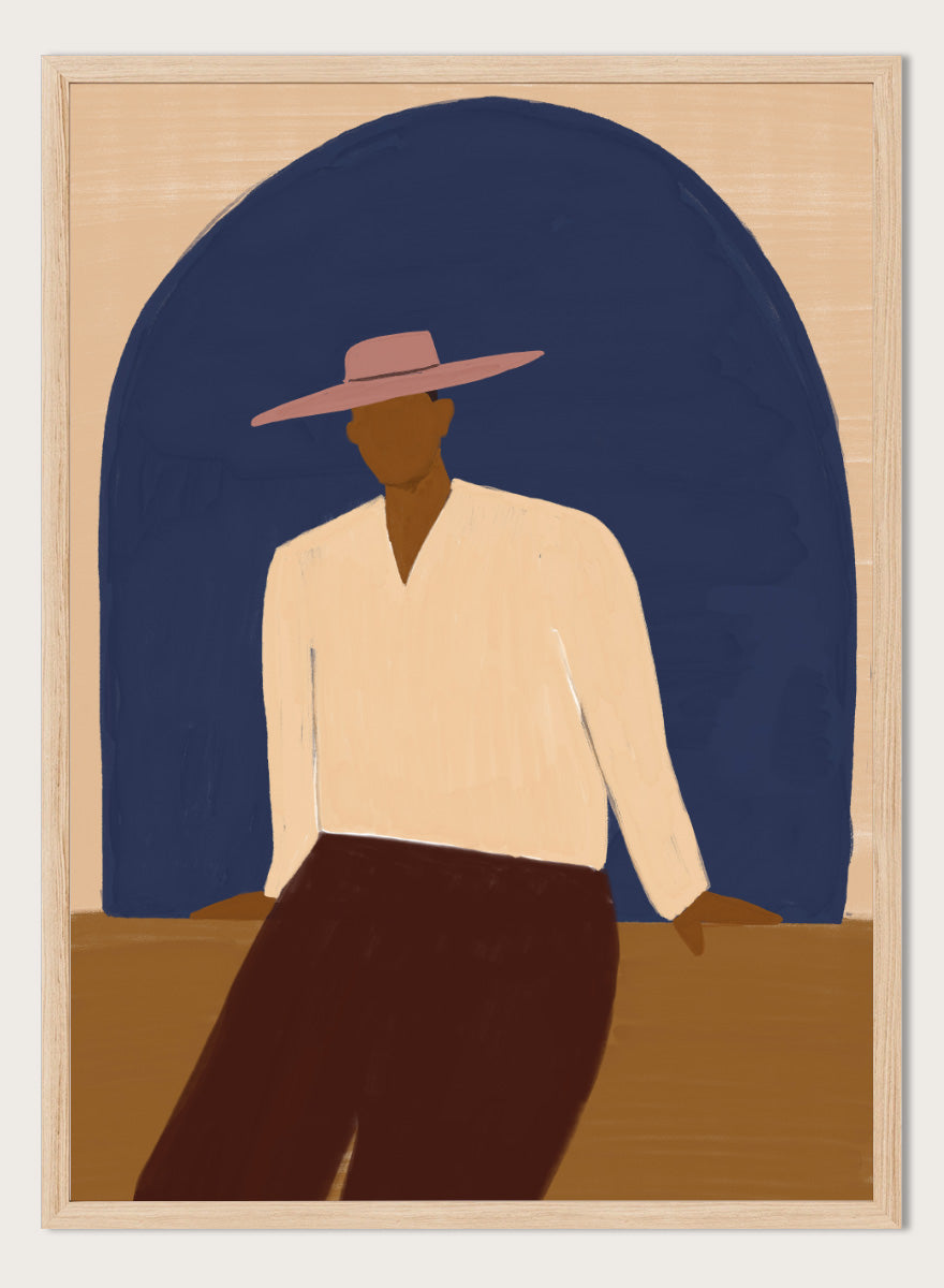 A stylized art print depicting a seated figure in a wide-brimmed pink hat, cream shirt, and dark brown trousers against a large dark blue arch on a beige background. Man In Blue Arch by The Art Concept portrait art print featuring a lone figure beneath a deep blue arch in warm earthy tones.