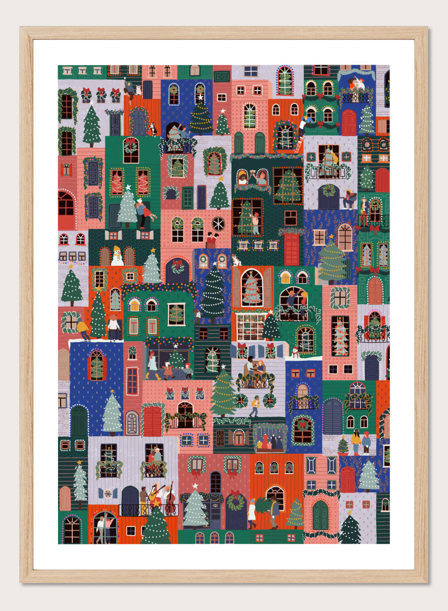 Shop Festive Christmas Town by Ceyda Alasar, a colorful Christmas wall art print poster featuring a lively holiday town filled with decorated homes and festive scenes.