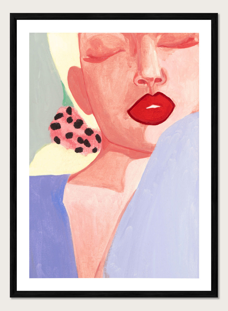 Shop Red Lips by Sophia Novosel, a modern woman portrait wall art print poster featuring bold red lips, closed eyes, soft pink tones, and a spotted earring.