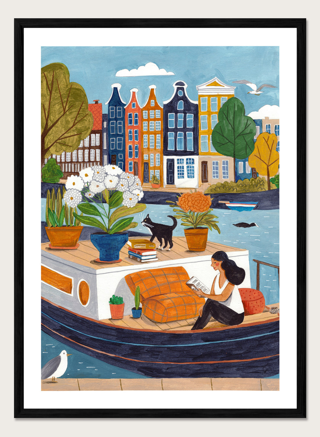 Illustration of a woman on a boat with flowers and a cat, surrounded by colorful houses. Cozy Canal Reading by Caroline Bonne Müller is a fine art print and wall poster featuring a woman reading on a canal boat with colorful European buildings in the background.