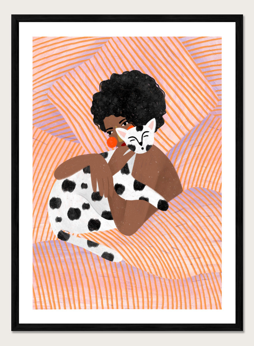 A framed art print featuring a stylized illustration of a person with an afro holding a black-and-white spotted cat, set against a peach and orange striped background. Cozy Cat Cuddles by Bea Müller animal art print featuring a woman embracing a spotted cat among soft peach and lilac stripes for cozy pet lover decor.