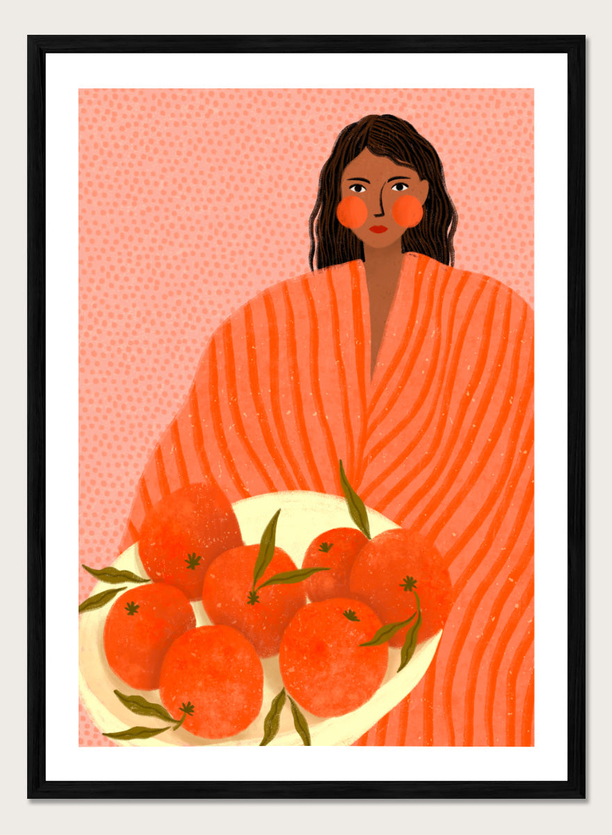 A stylized art print featuring a woman with dark hair wrapped in a bright orange striped blanket, holding a white plate of oranges against a pink dotted background. Woman Holding Oranges by Bea Müller colorful kitchen art print featuring a woman carrying fresh citrus fruit in warm orange and coral tones.
