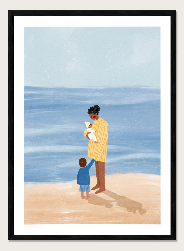 A framed art print featuring an illustration of a man in a yellow striped shirt holding a white dog on a beach next to a child in a blue coat, set against a light blue ocean and pale sky. Family Beach Day by Bea Müller art print featuring a mother with her baby and young child by the sea, created for warm family and coastal decor.