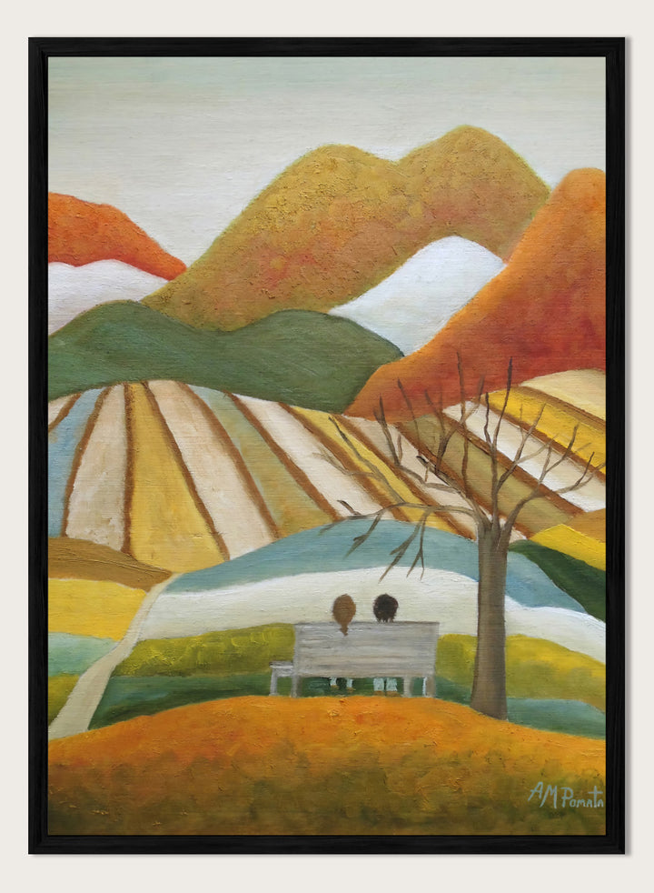A stylized landscape painting with layered mountains, terraced fields, a bare tree, and two small figures seated on a bench in the foreground. Shop Couple On Autumn Bench by Angeles M. Pomata, an autumn landscape and figurative art print featuring a seated couple, rolling hills, patchwork fields, and warm fall tones.