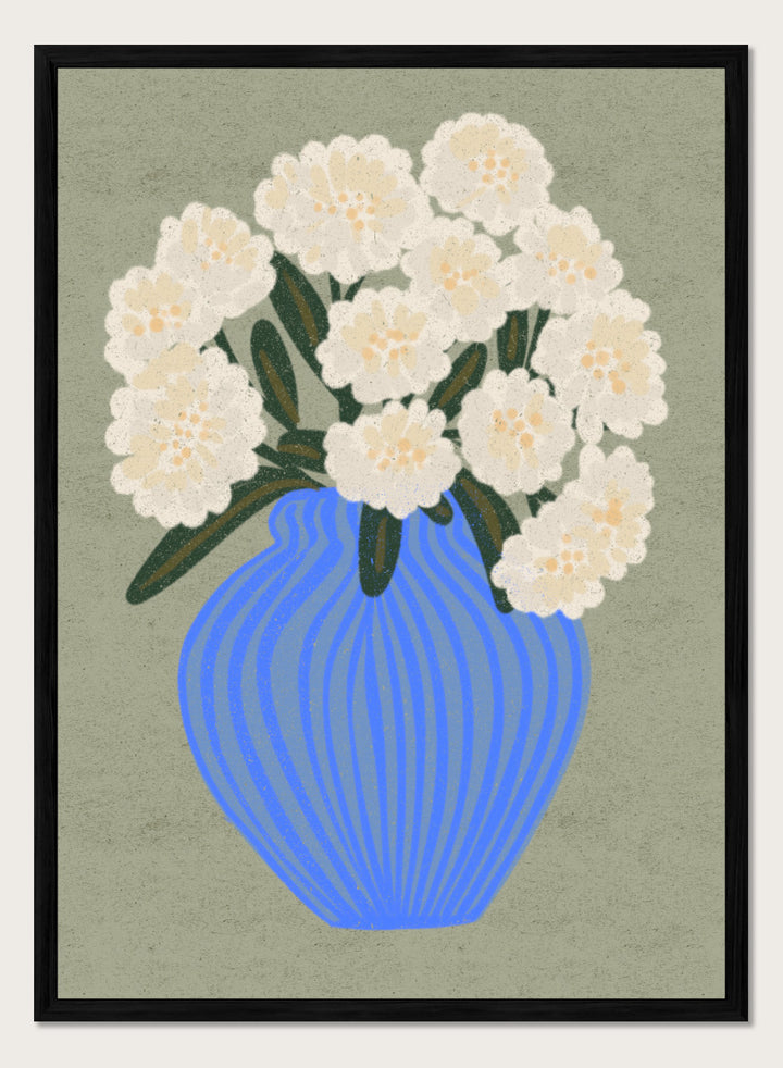 A stylized floral artwork showing a bouquet of off-white flowers with dark green leaves in a blue ribbed vase against a muted sage background. Shop White Blooms Blue Vase by Nikita Jariwala, a floral wall art print poster featuring white flowers in a striped blue vase with modern botanical style.
