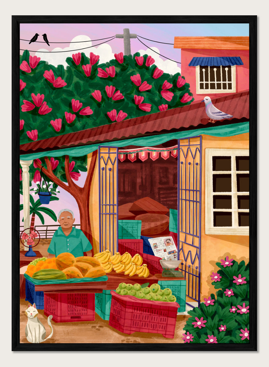 A colorful illustrated street market scene with a vendor standing behind tables of fruit and vegetables, a flowering tree, a house with pink flowers, crates, a pigeon on the roof, birds in the sky, and a white cat in the lower left. Colorful fruit stand art print by Nidhi Kachhadiya with fresh produce, floral details, and market charm. A cheerful print for kitchen or dining spaces.